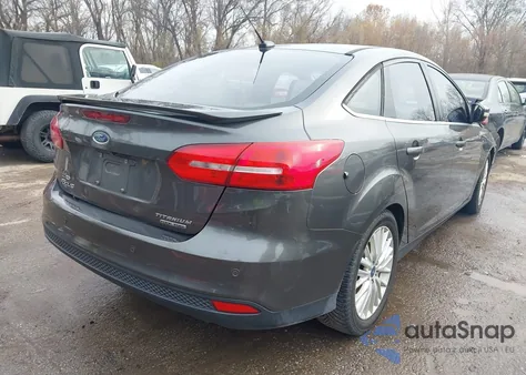 2015 Ford Focus Titanium из США, поврежденный, VIN 1FADP3J28FL293822